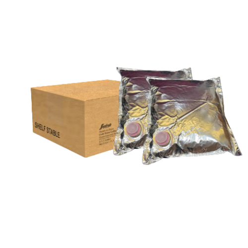 Two silver vacuum-sealed pouches with red circular seals, marked as "Rainforest Alliance Certified," sit next to a brown cardboard box labeled "Segafredo Zanetti Segafredo Brillante™ Cold Brew Ready-to-Drink - 2gal Bag in Box.