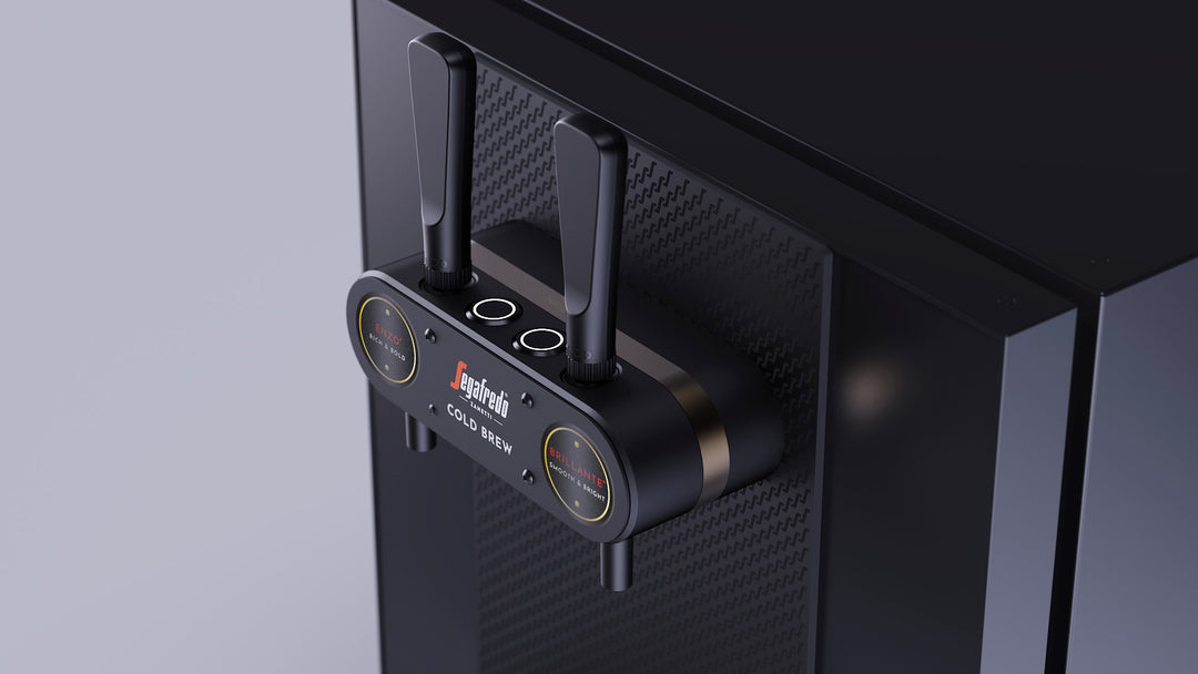 A black device labeled "Spotlink" and "4G/5G ENH" is mounted on a computer case next to the Segafredo Zanetti PRE-ORDER: Nitro Tap—contact your MZB sales rep for more information.