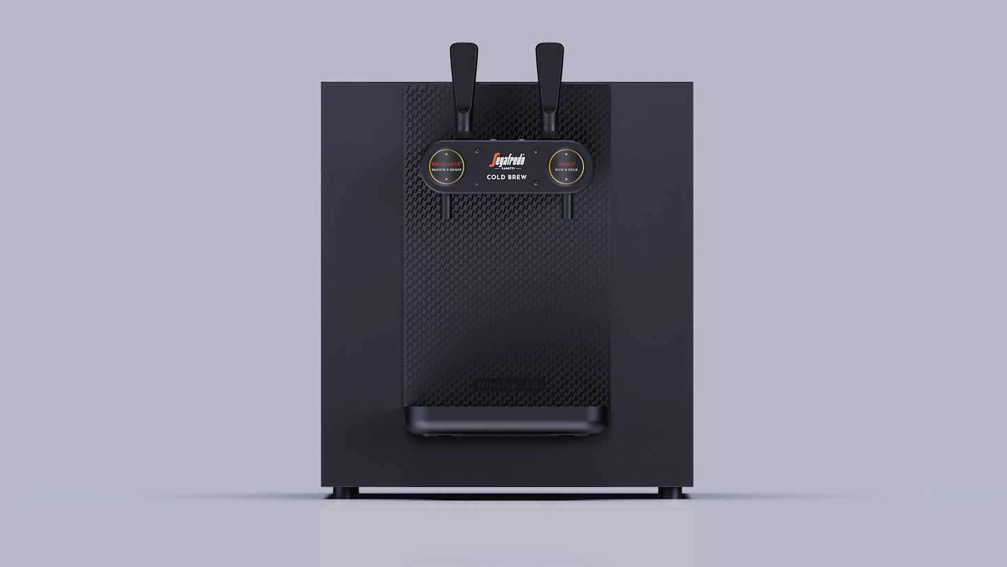 The Nitro Tap by Segafredo Zanetti is a black, box-shaped nitro cold brew dispenser featuring two levers and round front gauges, shown against a plain light gray background.