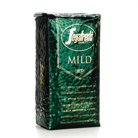 A package of Segafredo Zanetti Mild Espresso beans with velvety mouthfeel in a green, textured bag.