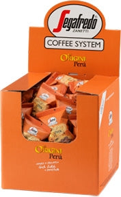 An orange Segafredo Zanetti coffee system display box contains individually wrapped Segafredo Zanetti Peru Single Origin Espresso Single-Serve Cartridges, offering a single origin espresso experience enriched with rich chocolate tones.