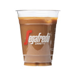 Load image into Gallery viewer, A Segafredo Branded Cold Beverage Clear Cup filled with light brown coffee and adorned with the Segafredo Zanetti logo, reminiscent of the elegant Clear Cold Beverage Cups used for iced drinks.
