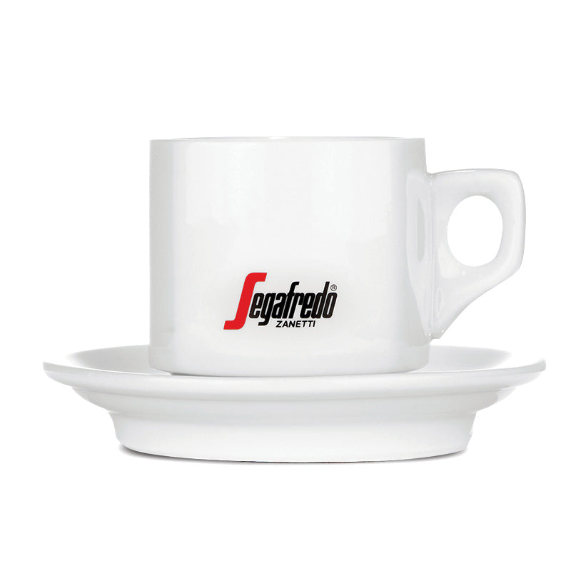 A Segafredo Branded Cup and Saucer Set with the Segafredo Zanetti logo sits gracefully on a matching white saucer set.