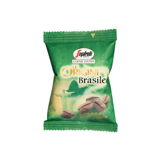 A sealed green packet of "Segafredo Zanetti Brazilian Single Origin Espresso Single-Serve Cartridges" featuring an illustration of coffee beans and the Christ the Redeemer statue, sourced from the Nossa Senhora da Guia plantation. Perfect for brewing with your Segafredo Espresso 1 Brewer.