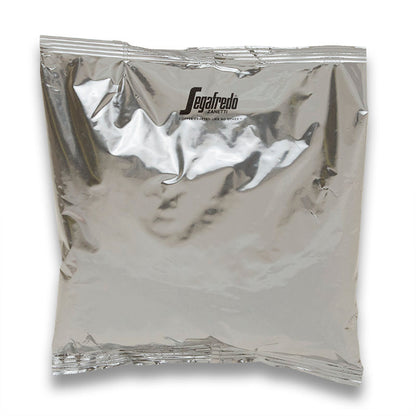 A sealed, silver foil packet with the "Segafredo Zanetti" brand name visible, typical packaging for Segafredo Montagna Dark Roast coffee products.