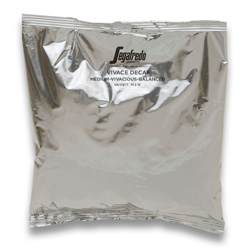 Silver vacuum-sealed coffee bag labeled "Segafredo Vivace Decaf Medium Roast, Segafredo Zanetti," featuring medium roasted Brazilian Arabicas.