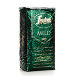 Load image into Gallery viewer, A package of Segafredo Zanetti Mild Espresso beans with velvety mouthfeel in a green, textured bag.
