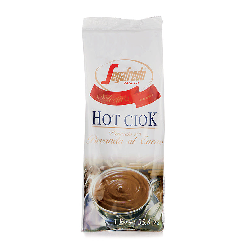 A 1 kg package of Segafredo Zanetti Hot Ciok (Hot Chocolate) mix displayed upright with a picture of a cup of prepared hot cocoa, boasting high cocoa butter content.
