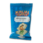 Load image into Gallery viewer, A bag of Kauai Coffee Medium Roast with an illustration of a hula dancer on a blue background.
