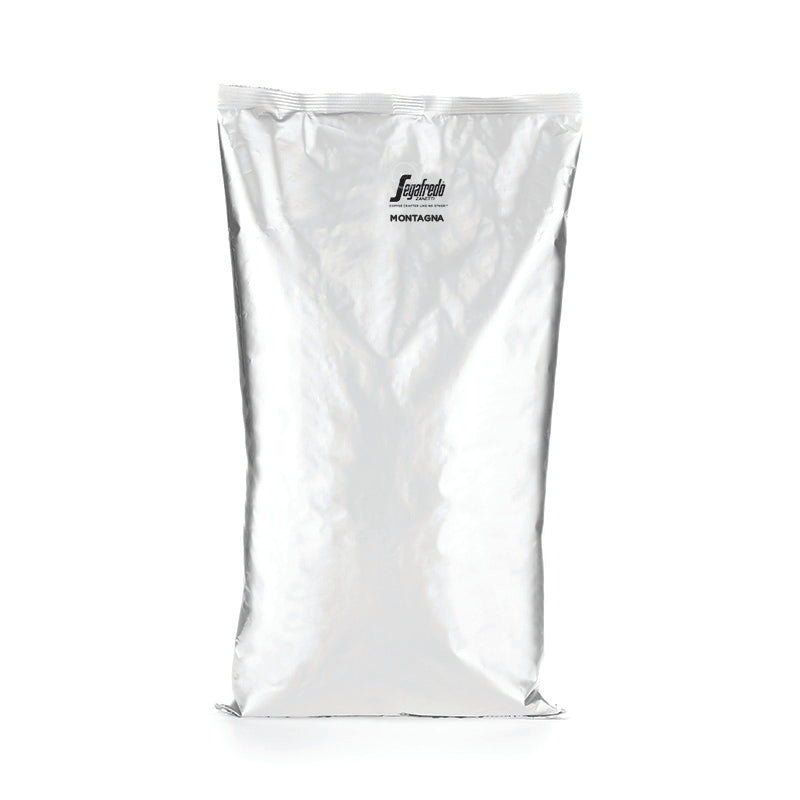 A sealed, silver foil packaging bag with the brand name "Segafredo Zanetti" and the product name "Segafredo Montagna Dark Roast" printed in black text on the front.
